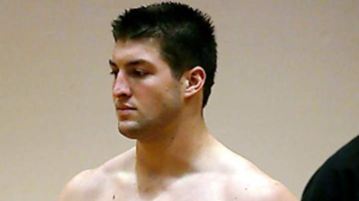 Tim Tebow won't hide from NFL scouts -- or hide his beliefs