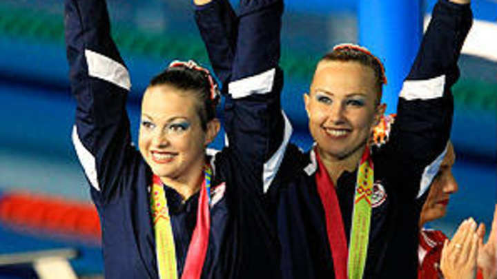Synchronized swimming duet sacrifices normalcy for Olympics