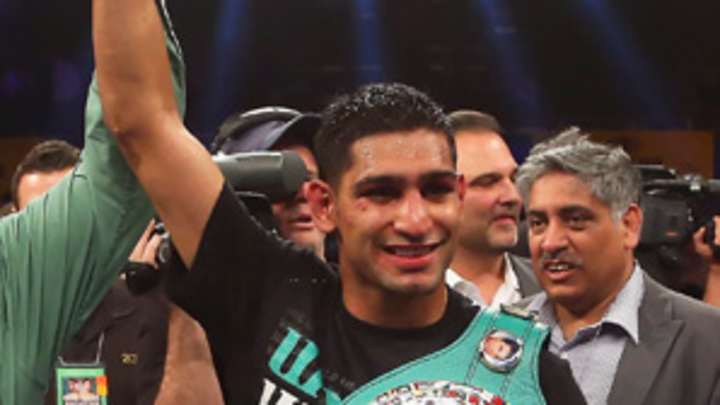 Khan stops Molina in comeback fight