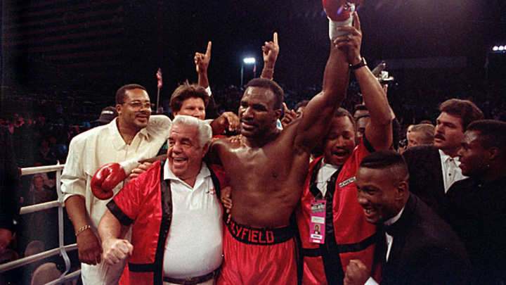 Holyfield, last great American heavyweight, says he's retiring