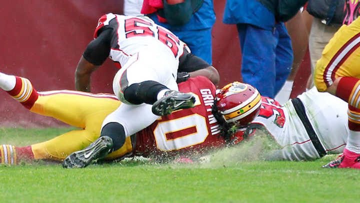 Robert Griffin III hurt on hit by Atlanta's Sean Weatherspoon