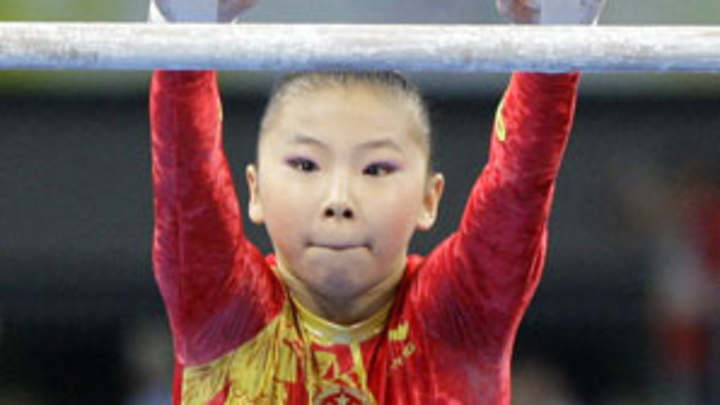 China's He edges Liukin with uneven bars tiebreaker China's He edges Liukin with uneven bars tiebreaker