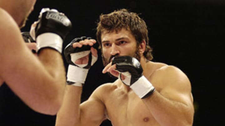 Arlovski steps up training regimen, enlists former boxing champion Arlovski steps up training regimen, enlists former boxing champion