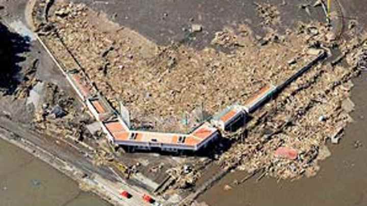 After quake and tsunami, public split on baseball's return to Japan