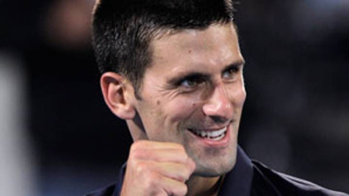 Djokovic retains World Tennis title by sinking Almagro Djokovic retains World Tennis title by sinking Almagro