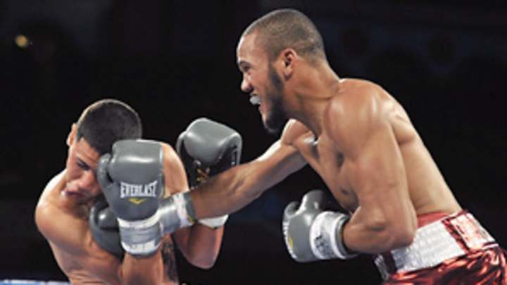 Broner pummels DeMarco, takes lightweight title