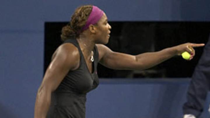 Serena given record fine, probation for outburst at U.S. Open