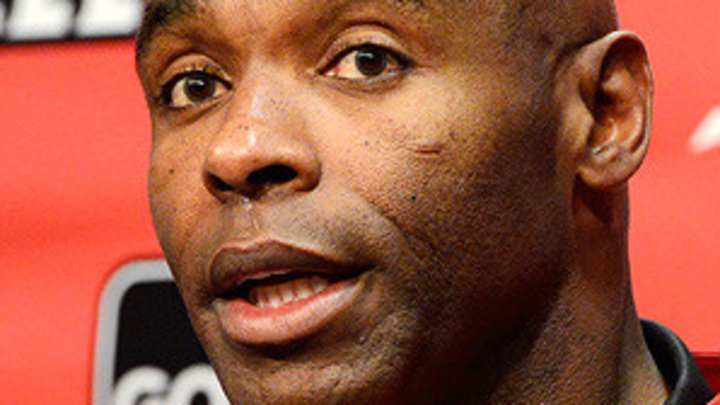 Ex-Louisville football player sues school, coach