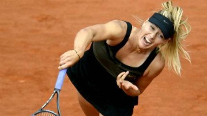 Sharapova relentless in French Open final, completes career Slam