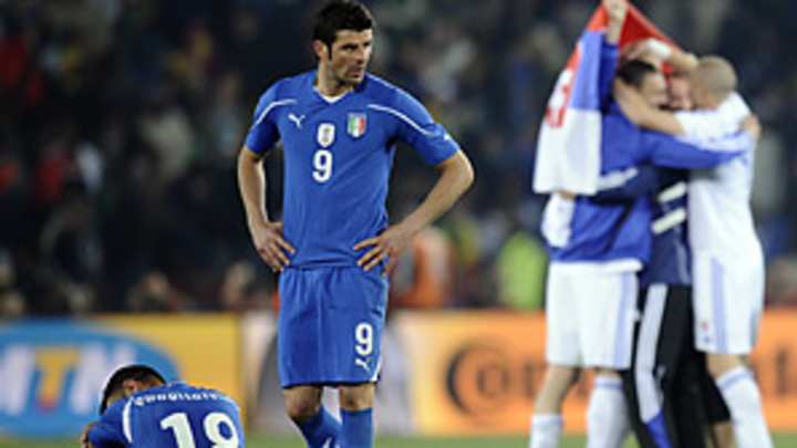 World Cup Daily: Defending champ Italy humbled, Japan sparkles