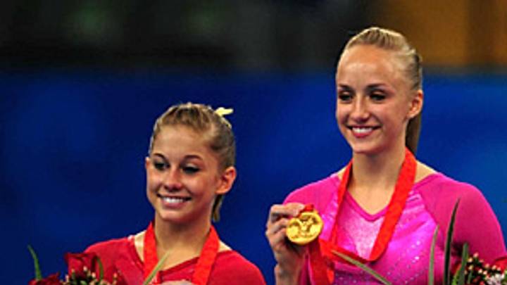 Liukin and Johnson push each other to all-around glory Liukin and Johnson push each other to all-around glory