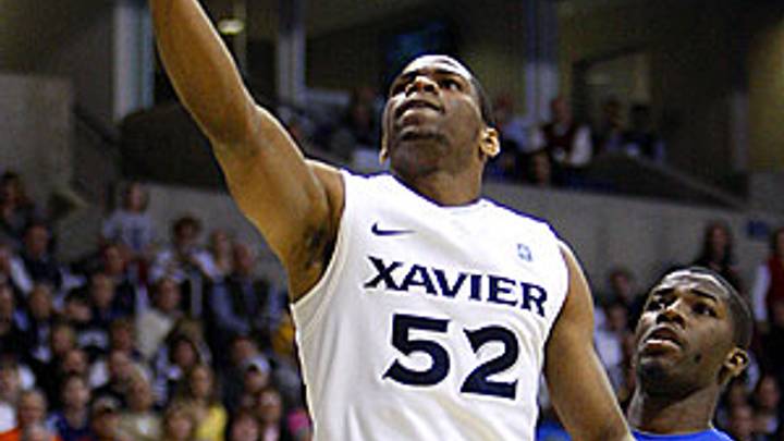 Diminutive but tough, Holloway comes up big for Xavier on court