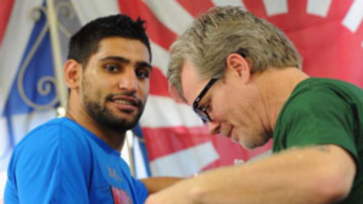Amir Khan decides to split with trainer Freddie Roach Amir Khan decides to split with trainer Freddie Roach