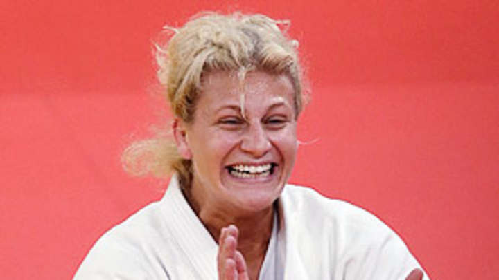 Painful personal journey ends with historic gold for Kayla Harrison