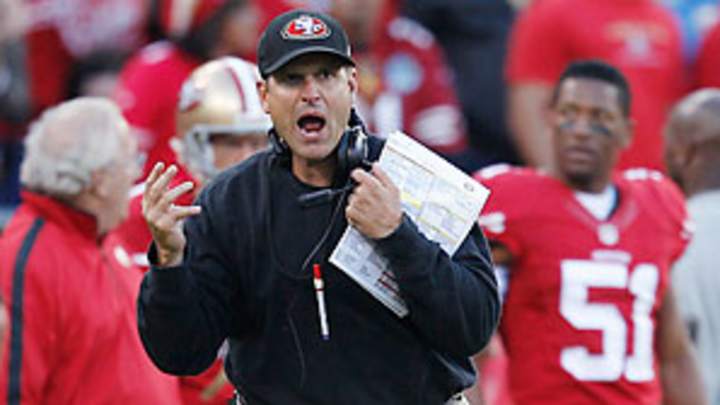 Harbaugh returns to Niners after heart procedure