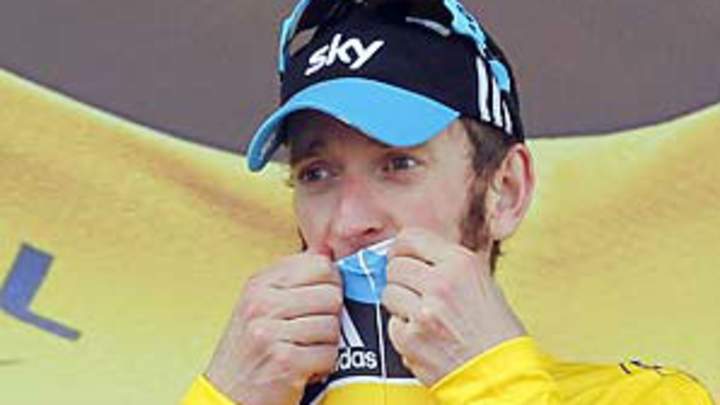 Wiggins all but clinches Tour de France with 19th stage victory