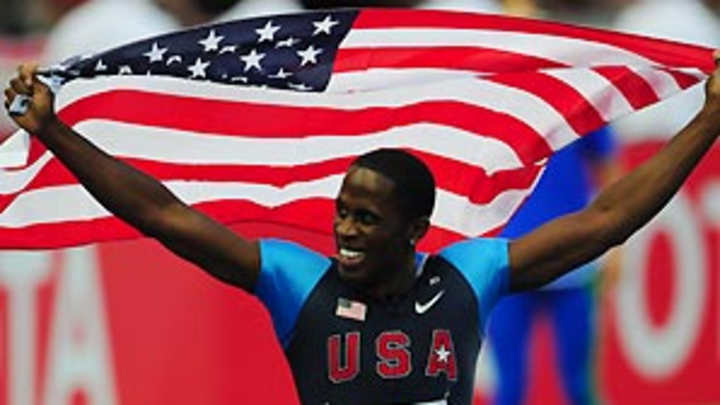 Phillips rises to occasion, honors Owens with world long jump gold
