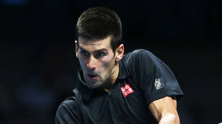 Top-ranked Djokovic holds off Murray at ATP Finals Top-ranked Djokovic holds off Murray at ATP Finals