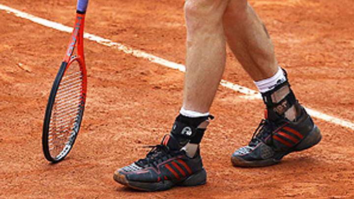 Andy Murray plays through pain, Petra Kvitova rolls into round 3 Andy Murray plays through pain, Petra Kvitova rolls into round 3