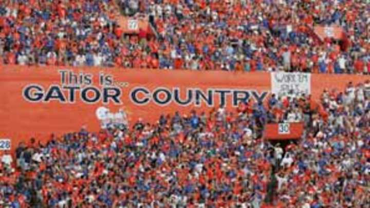 Fans flock to football games, but schools feel the travel pinch