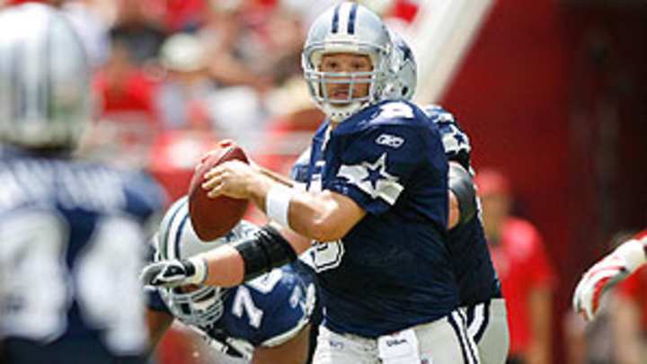 Romo shoots down doubters with attack on passing efficiency records