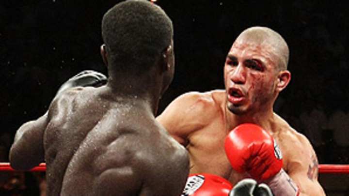 Cotto returns to ranks of elite with hard-fought decision over Clottey
