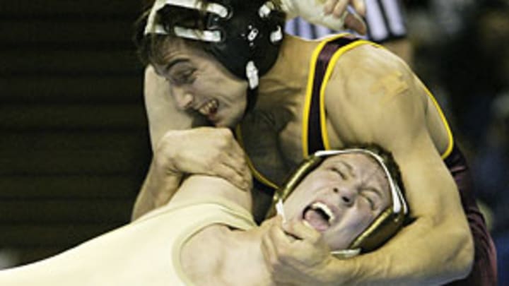 As college wrestling programs face cuts everywhere, MMA steps up