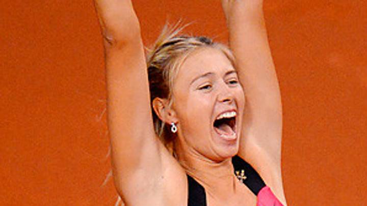Sharapova rolls past Azarenka in Porsche Grand Prix final Sharapova rolls past Azarenka in Porsche Grand Prix final