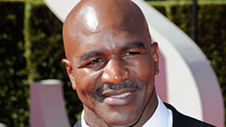 Holyfield sues to stop sale of some memorabilia