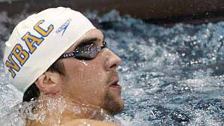 Phelps shakes off rust to try new stroke in first meet since Beijing Phelps shakes off rust to try new stroke in first meet since Beijing
