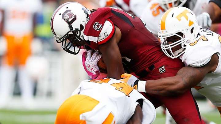 Marcus Lattimore leaves South Carolina-Tennessee game with knee injury Marcus Lattimore leaves South Carolina-Tennessee game with knee injury