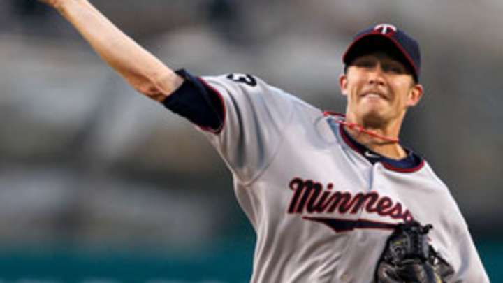 Cubs reach deal with ex-Twin Baker