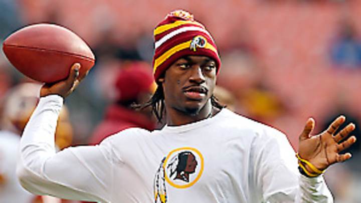 RGIII practices for Redskins, hoping to start Sunday RGIII practices for Redskins, hoping to start Sunday