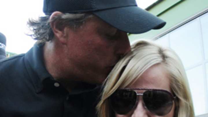 Why the fascination with athletes' wives? It shows a human side Why the fascination with athletes' wives? It shows a human side