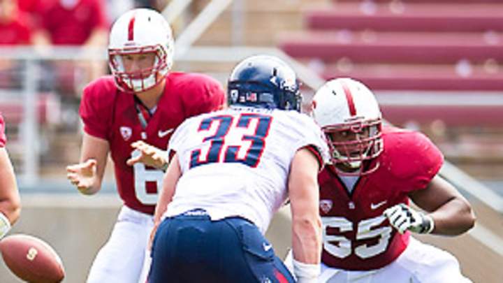 The anti-spread offense: Stanford, Florida loading field with linemen