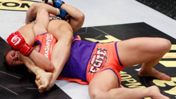 Rousey's improbable rise continues with armbar submission of Tate