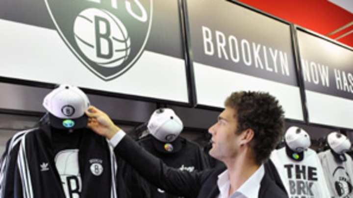 Nets open wallet to lock up Lopez, but Howard rumors will rise again