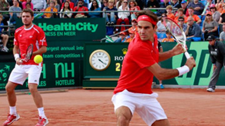 Netherlands outlast Federer-led Swiss in doubles Netherlands outlast Federer-led Swiss in doubles
