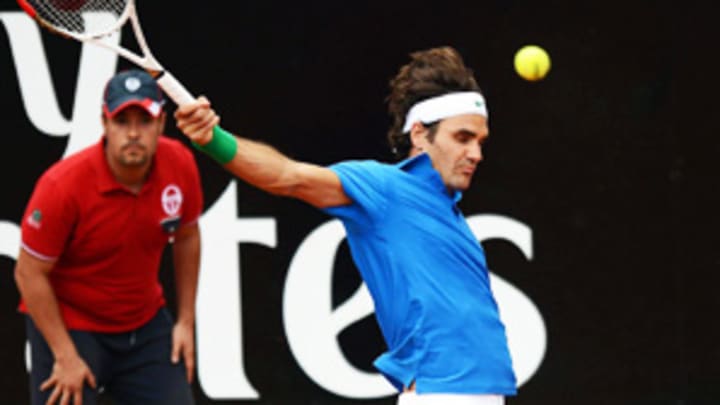Federer, Serena advance at Italian Open