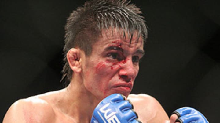 Torres outlasts Mizugaki in five rounds to keep WEC title Torres outlasts Mizugaki in five rounds to keep WEC title