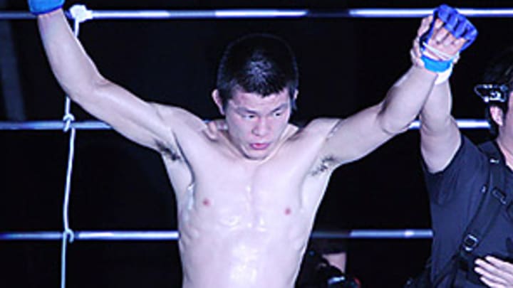 Aoki claims Dream lightweight title