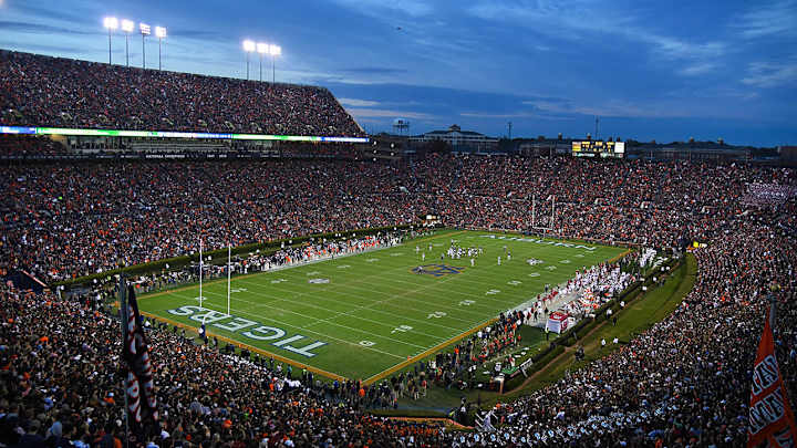 Photographer Carted Off Field at Georgia-Auburn Game After Hit on Sidelines Photographer Carted Off Field at Georgia-Auburn Game After Hit on Sidelines