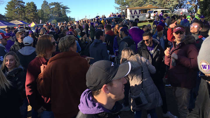 Come Together: Huskies, Cougars Fans Share the  Moment