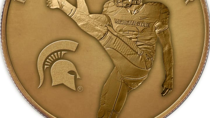 Big Ten to Use Commemorative Coin at Football Games To Honor Spartan Mike Sadler & Husker Sam Foltz Big Ten to Use Commemorative Coin at Football Games To Honor Spartan Mike Sadler & Husker Sam Foltz