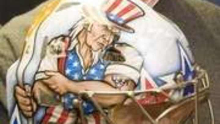 The Spartan Nationâ€™s Ryan Miller Prepares for Olympic Glory and a Man from Michigan Prepares His Helmet.