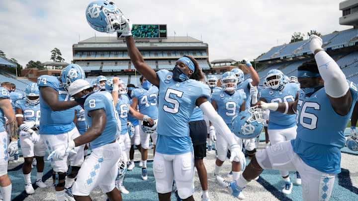 Javonte Williams and The Heels Cruise by Syracuse, 31-6