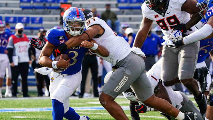Oklahoma State Crushes Kansas 47-7 in Lawrence Oklahoma State Crushes Kansas 47-7 in Lawrence