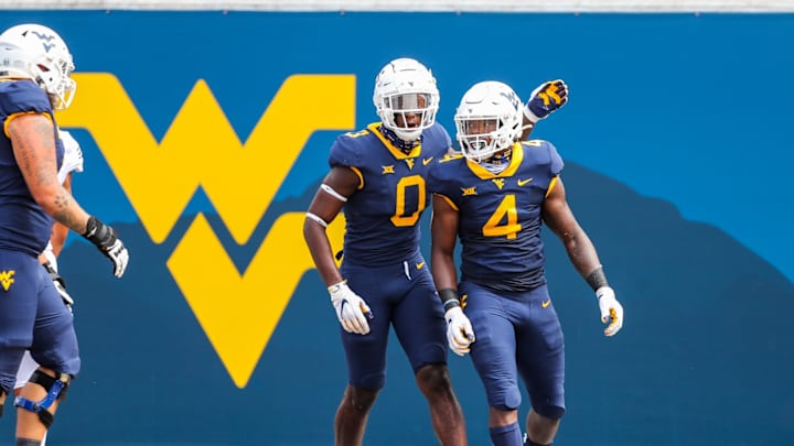 Spread & Over/Under Predictions for WVU vs Kansas