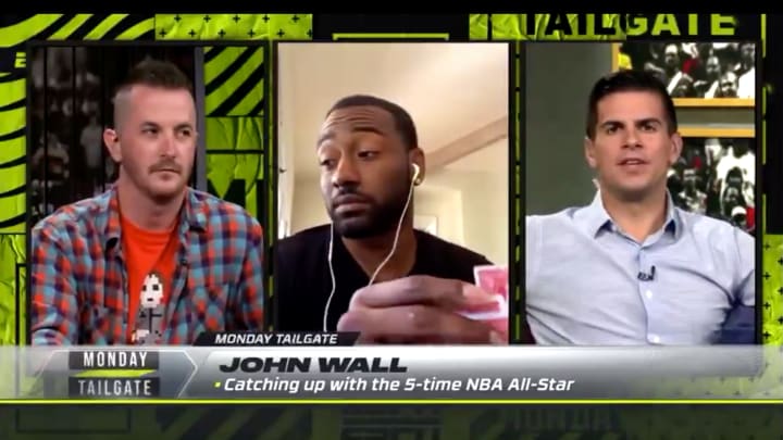 John Wall Plays Spades, Gets Distracted During ESPN Interview John Wall Plays Spades, Gets Distracted During ESPN Interview