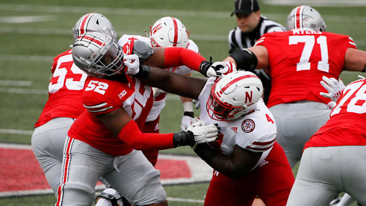 Wyatt Davis Becomes Unanimous All-American, Haskell Garrett and Shaun Wade Also Earn First Team Honors